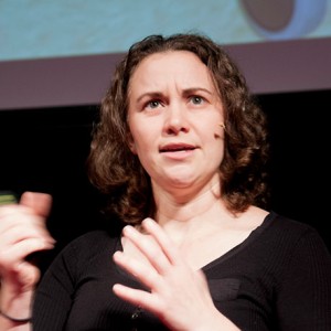 Photo of Pia Andrews talking at an event